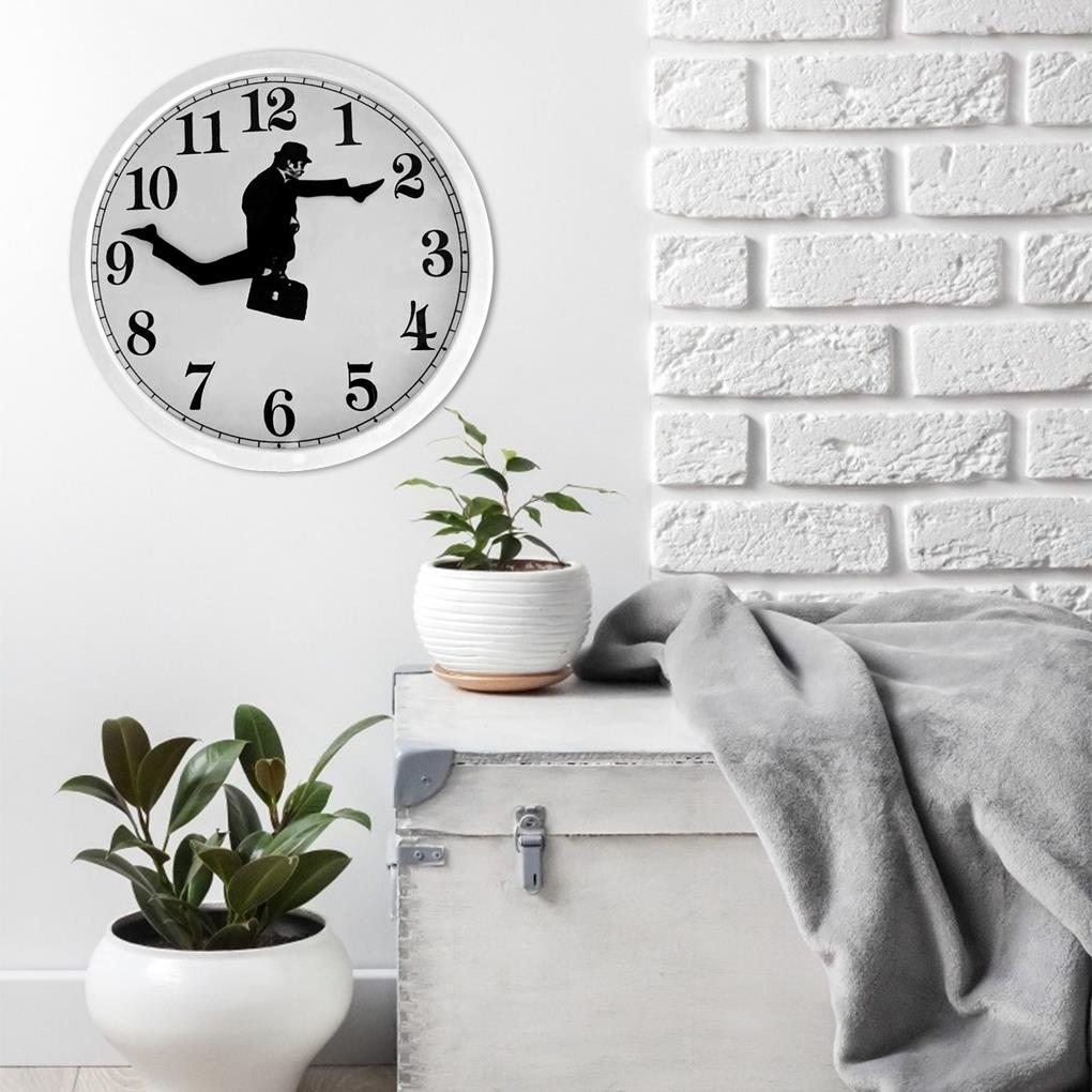 Carvallo – Kreativt väggur med unik illustration av rörlig man och coola siffror