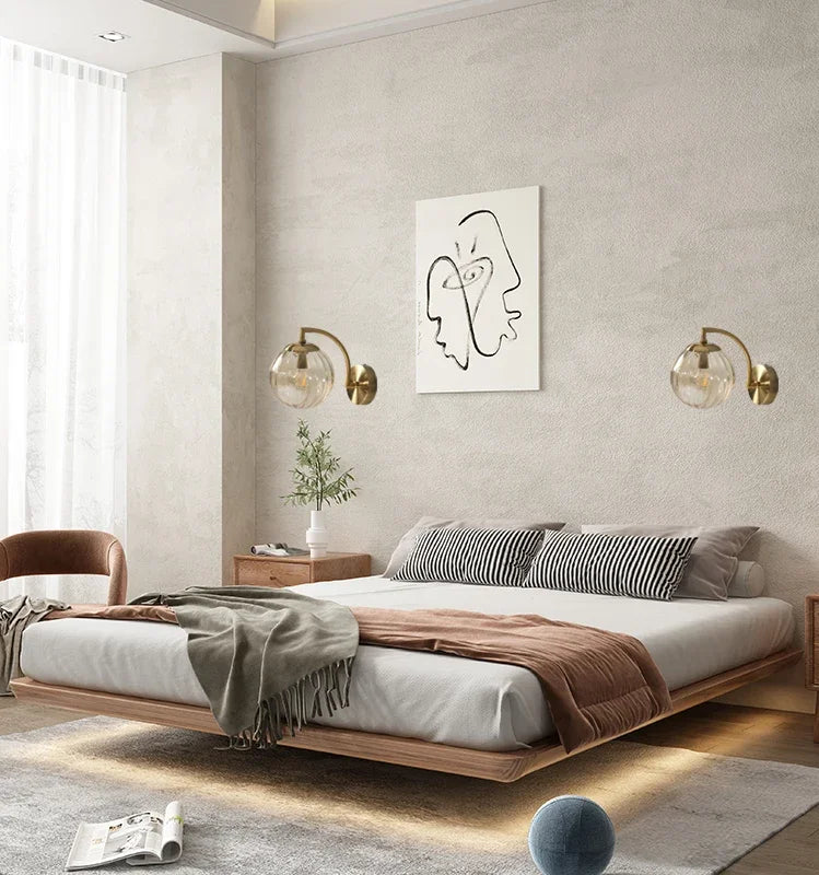 Elegant vägglampa med glasdesign