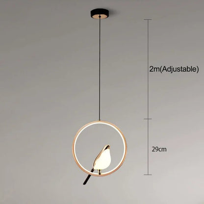 Aviora | Hänglampa med gyllene fågel och LED-ljus