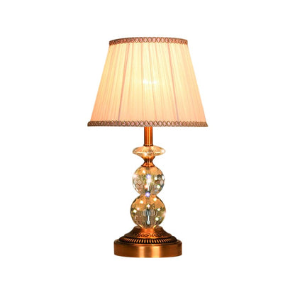 Kristallbordslampa med konisk form och slipade kristallkulor