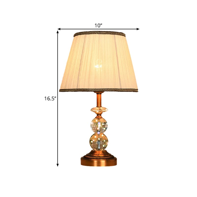 Kristallbordslampa med konisk form och slipade kristallkulor