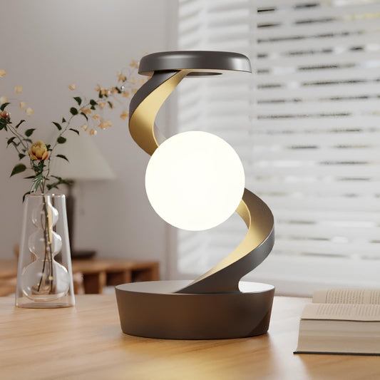 Minimalistisk spiralbordslampa med lysande sfärdesign