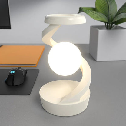 Minimalistisk spiralbordslampa med lysande sfärdesign