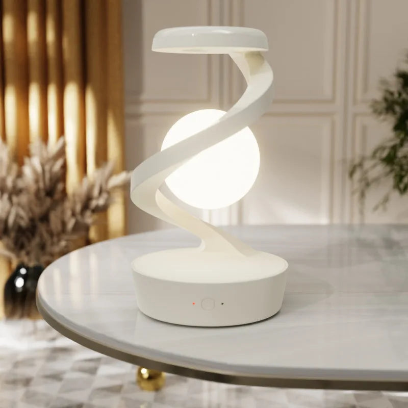 Minimalistisk spiralbordslampa med lysande sfärdesign