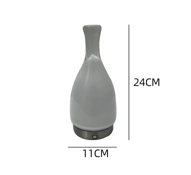 LumeCarry – Bärbar LED Flasketta med Läderhandtag