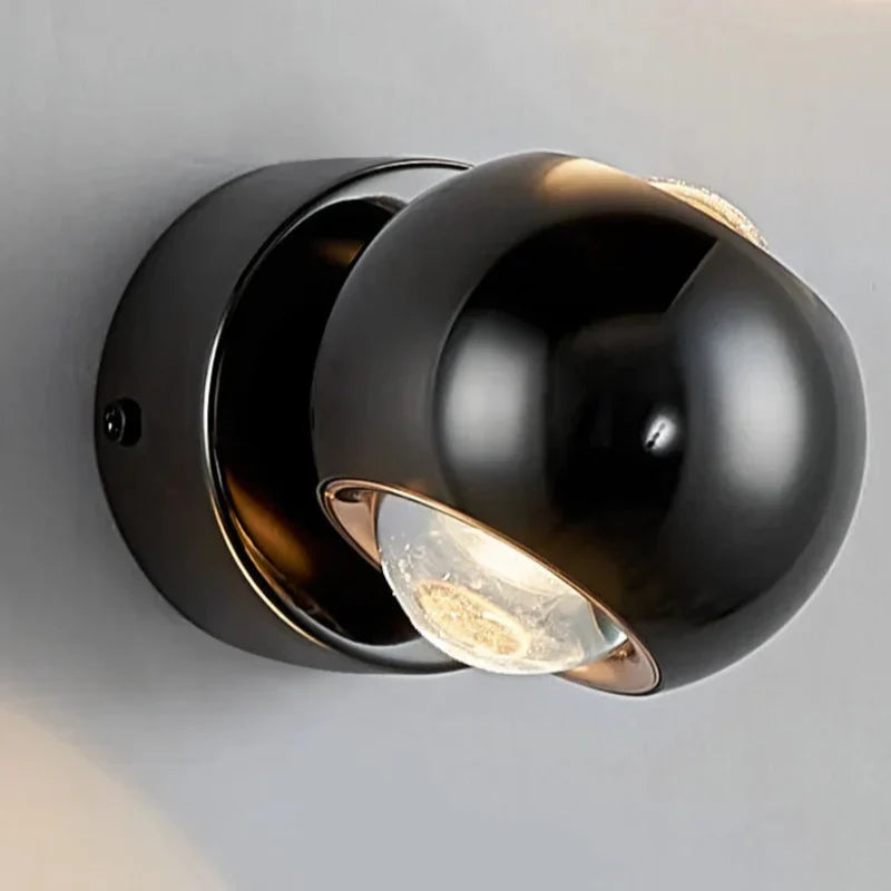 Orbis LED-vägglampa – Rotabel kulformad lampa i svart med 360° ljusriktning