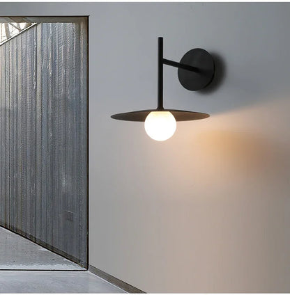 Modern roterbar LED-vägglampa Aralyn – Minimalistisk design i svart
