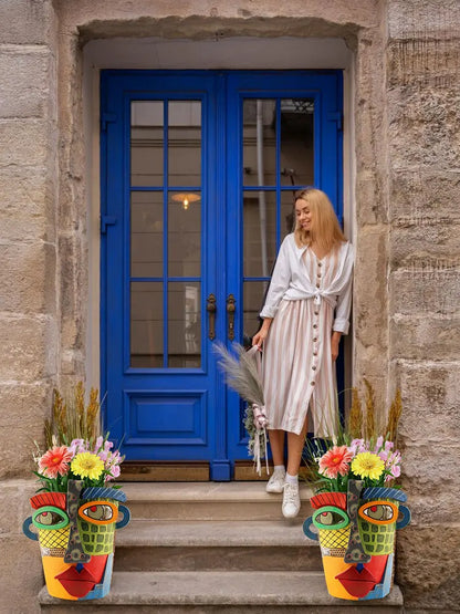 Färgglad ansikts-blomkruka – Kreativ dekoration för hemmet och trädgården