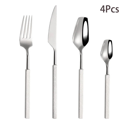 Varlund | 4-delat bestickset i rostfritt stål med hammarslag-design