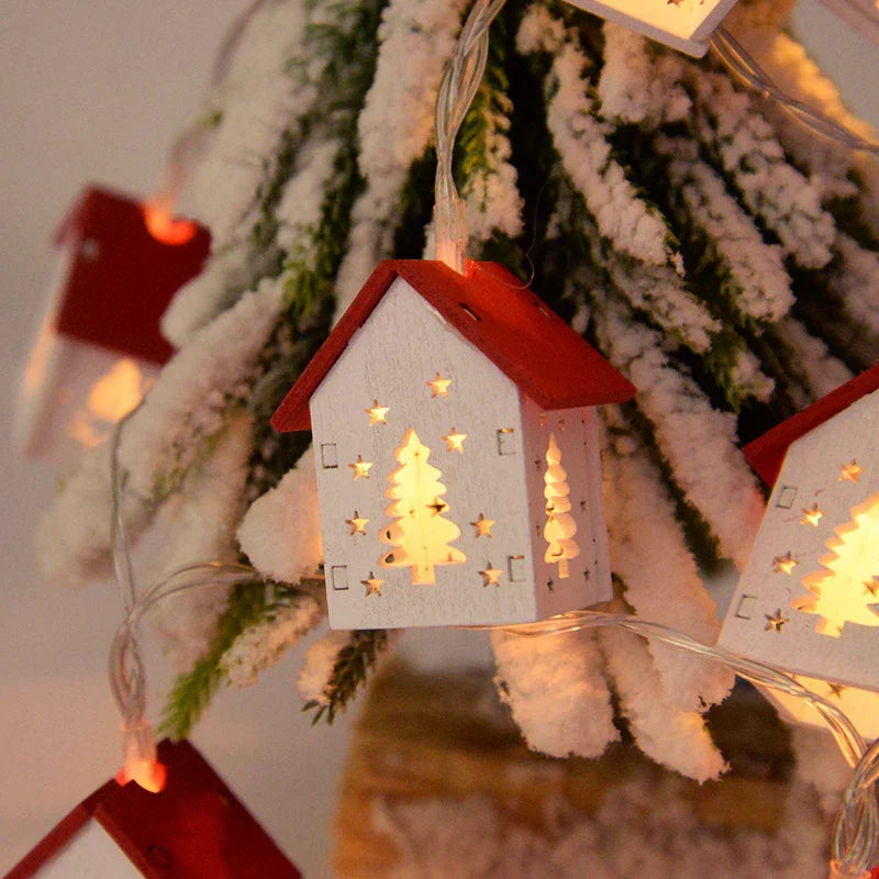 Träjuletidshus med LED-belysning för festlig dekoration