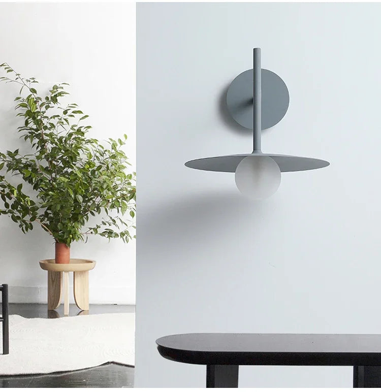 Modern roterbar LED-vägglampa Aralyn – Minimalistisk design i svart