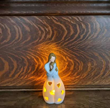 Symbolisk mor-och-barn-ljusstake