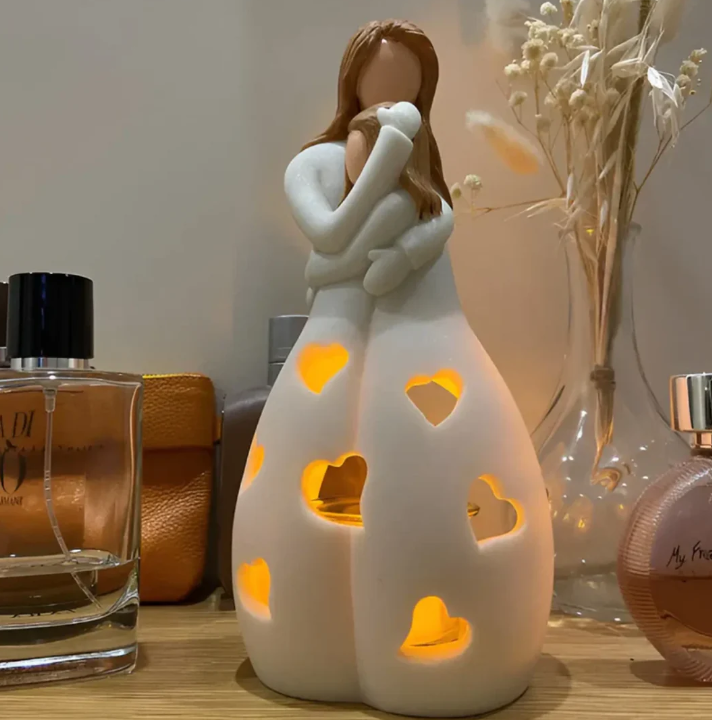 Symbolisk mor-och-barn-ljusstake