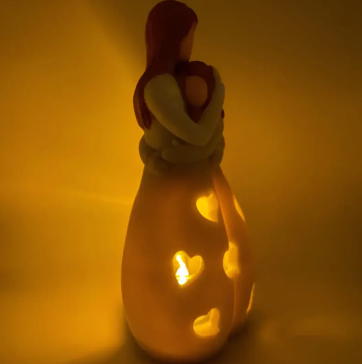 Symbolisk mor-och-barn-ljusstake