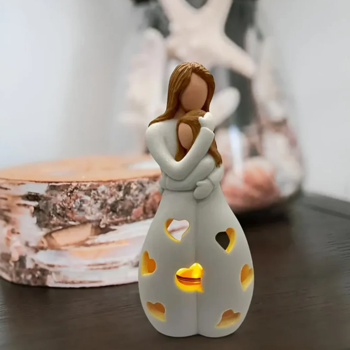 Symbolisk mor-och-barn-ljusstake