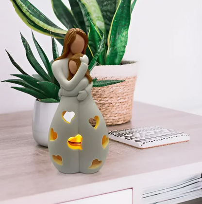 Symbolisk mor-och-barn-ljusstake