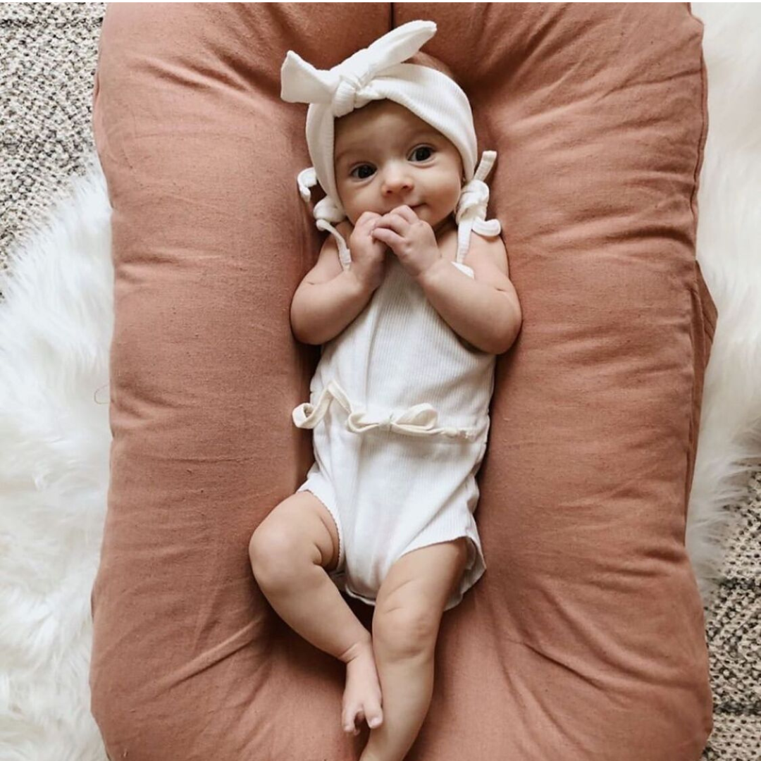 Bärbar Baby Kudde