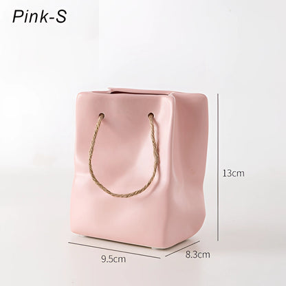 Tidlösa keramikvasdesign i stil med en shoppingkorg – Elegant vas för torkade blommor