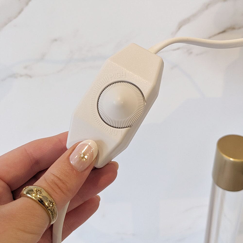 Carvallo – Lyxigt Ljusvärmare med Eleganta Gulddetaljer