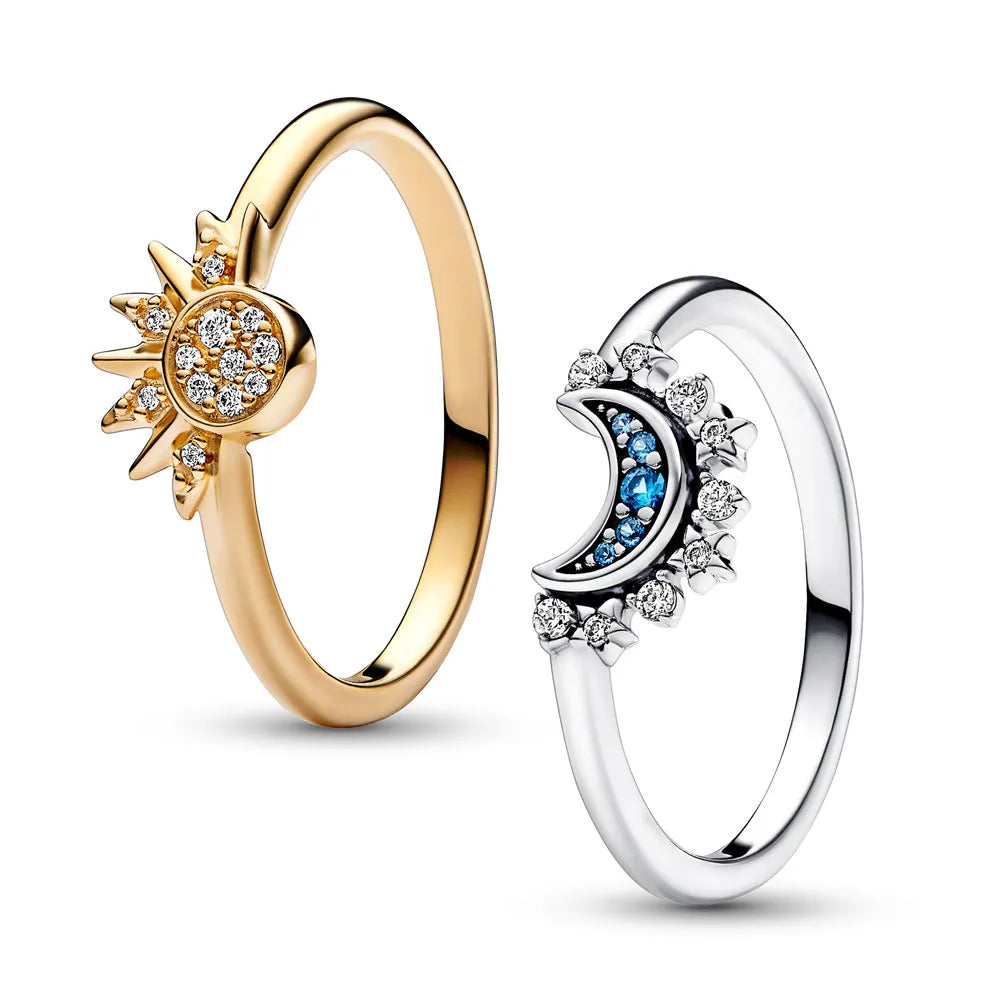 Kristalluttalande ring med sol- och måndesign