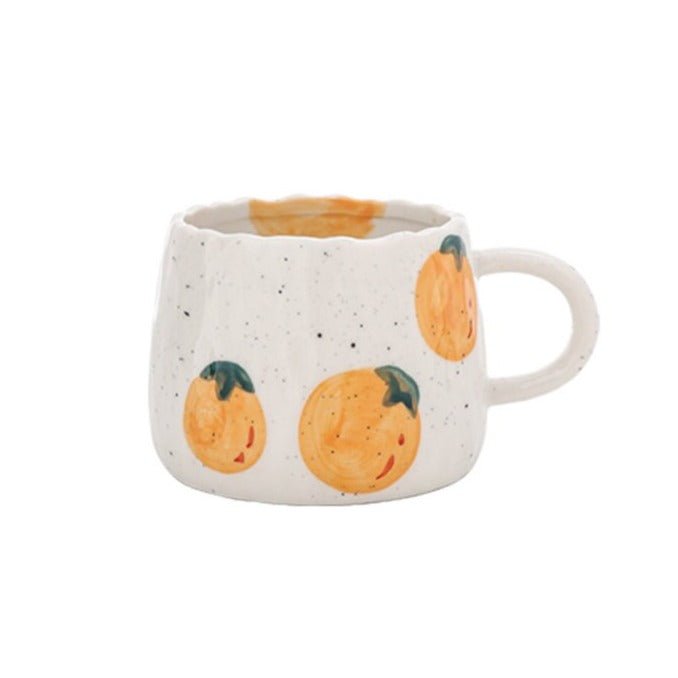 Keramisk kaffekopp med lekfullt fruktdesign