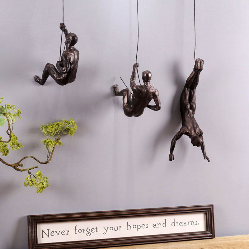 ArtiClimb Väggfigur | Klättrande skulptur i konstharp