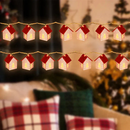Träjuletidshus med LED-belysning för festlig dekoration