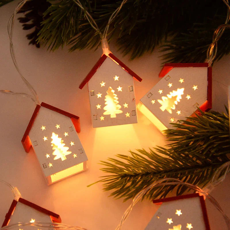 Träjuletidshus med LED-belysning för festlig dekoration