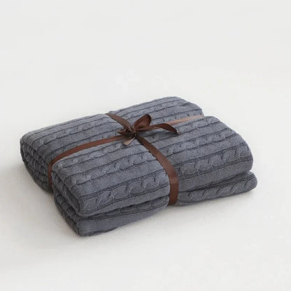 Stickad bomull enfärgad pläd för mysigt bekvämlighet