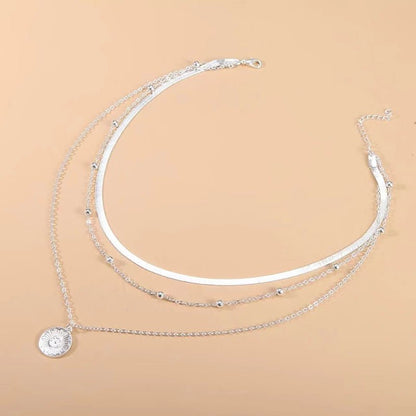 LUNÉA HALSKETTE – Elegant silver trefaldig halsband för tidlös stil