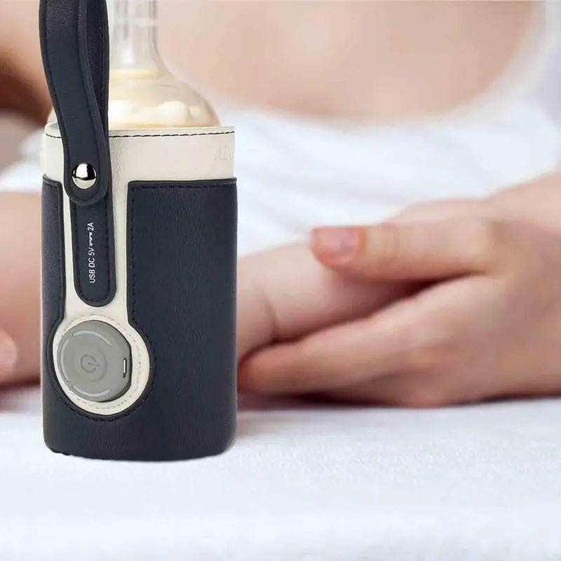 Mamago Pro - Bärbar babyflaskevärmare, skötväska och rese-säng i ett