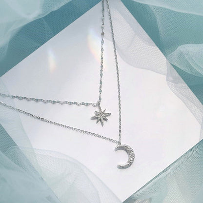 MOONSHINE NECKLACE - Dubbelmåne-halsband för elegans och romantik