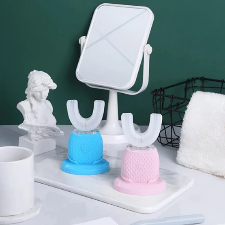 Elektrisk tandborste med blått ljus blekning