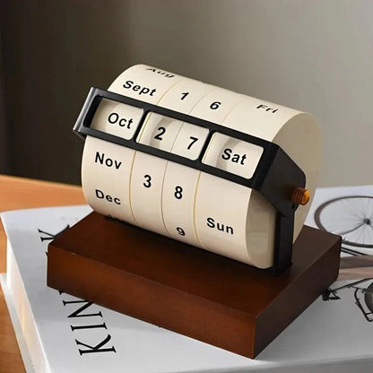 Modern evig hjul skrivbordskalender i trä och metall