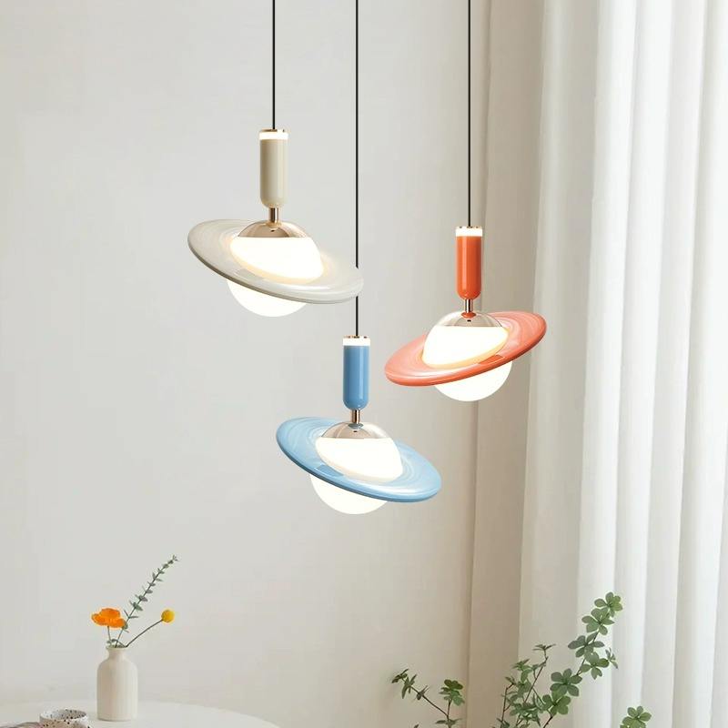 OrbitGlow – Saturn-inspired pendant lamps in playful pastel colors