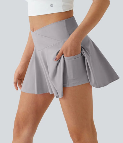 SOFTLYZERO Tenniskjol - Mini med shorts, korsad midja och UPF50+ skydd