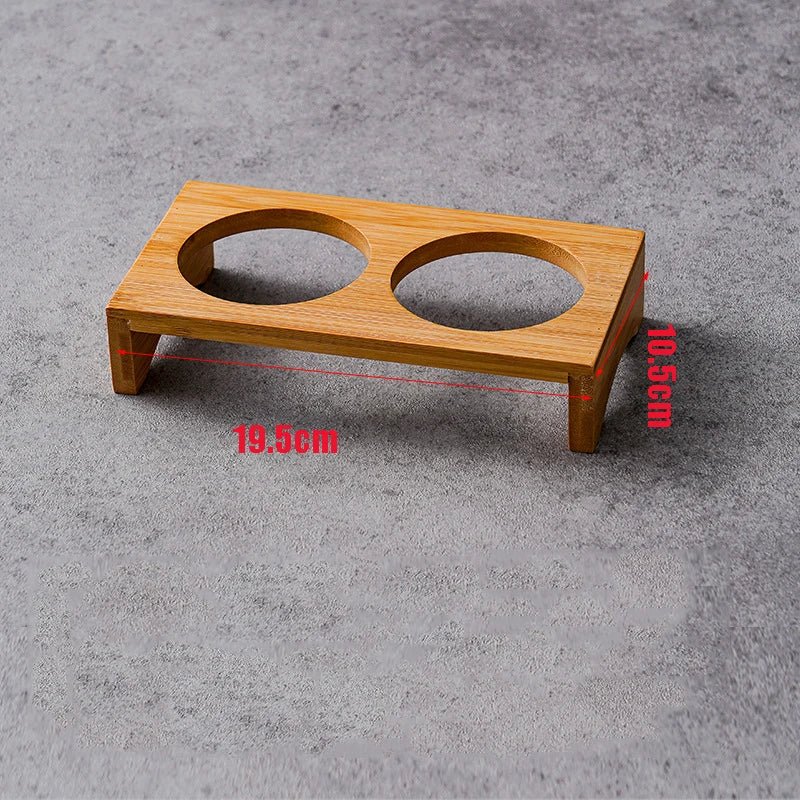 Set i rostfritt stål dip-skålar på serveringbricka i bambu