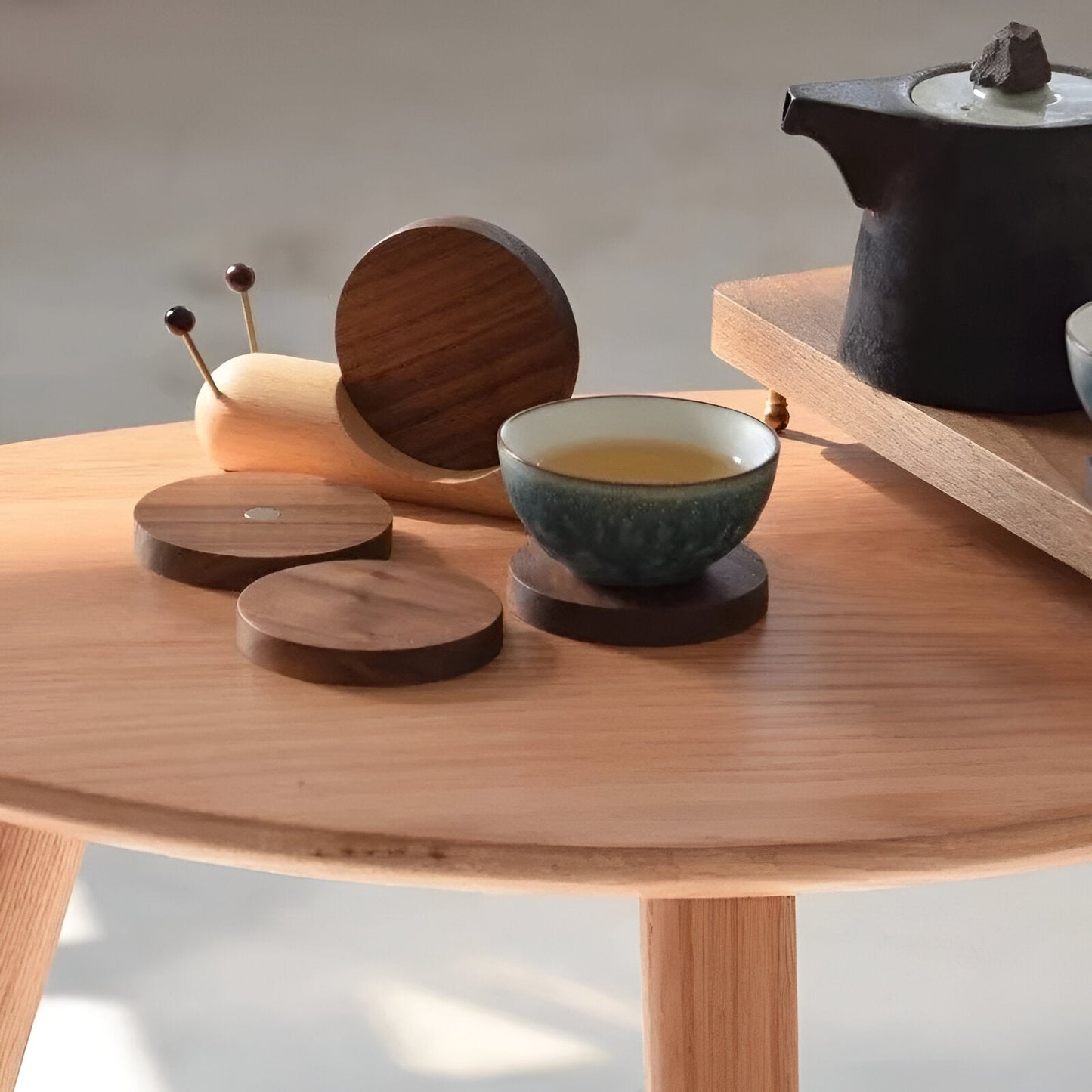 Valnötsträ Snigel Te- och Kaffekoppsunderlägg - Söt Dekor